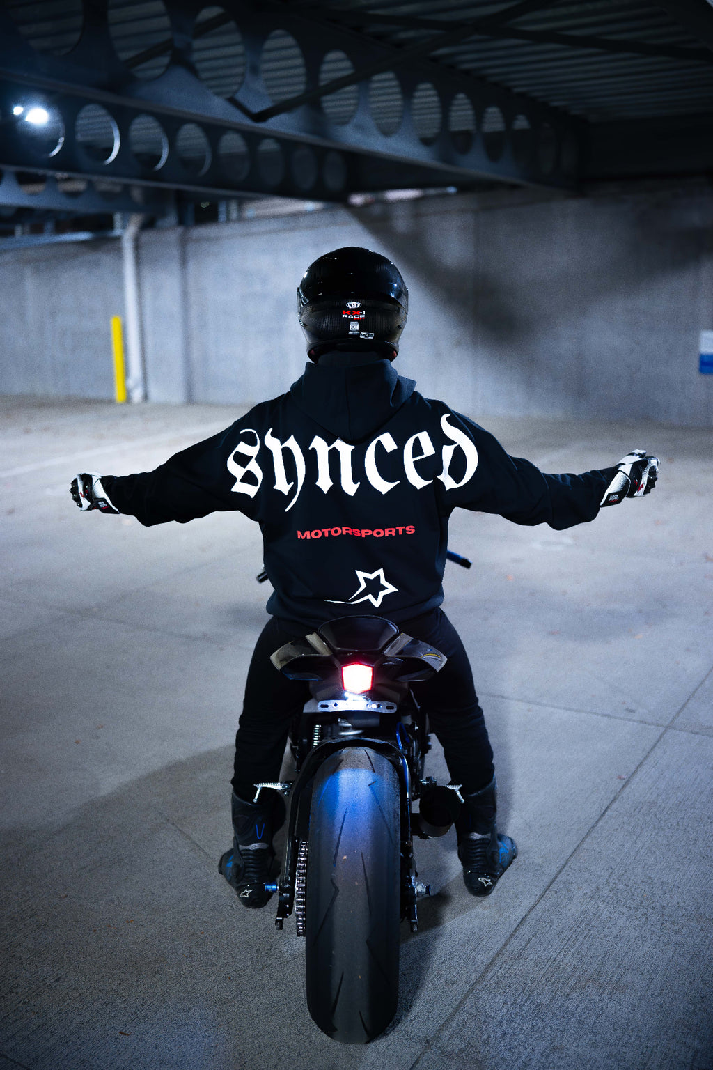Synced Motorsports Core Hoodie full back view on motorcycle
